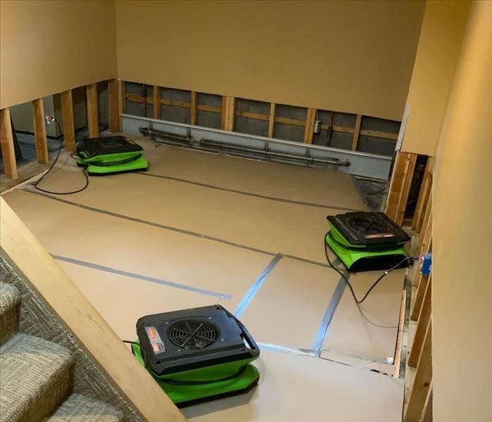 Room with flood cuts and SERVPRO drying equipment